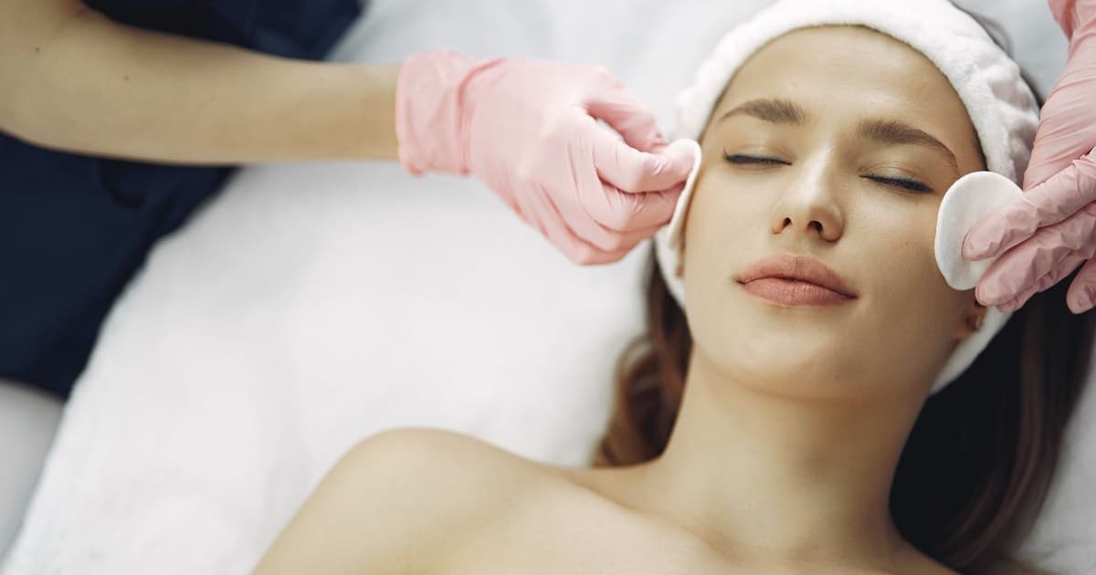 Client receiving a gentle professional facial treatment