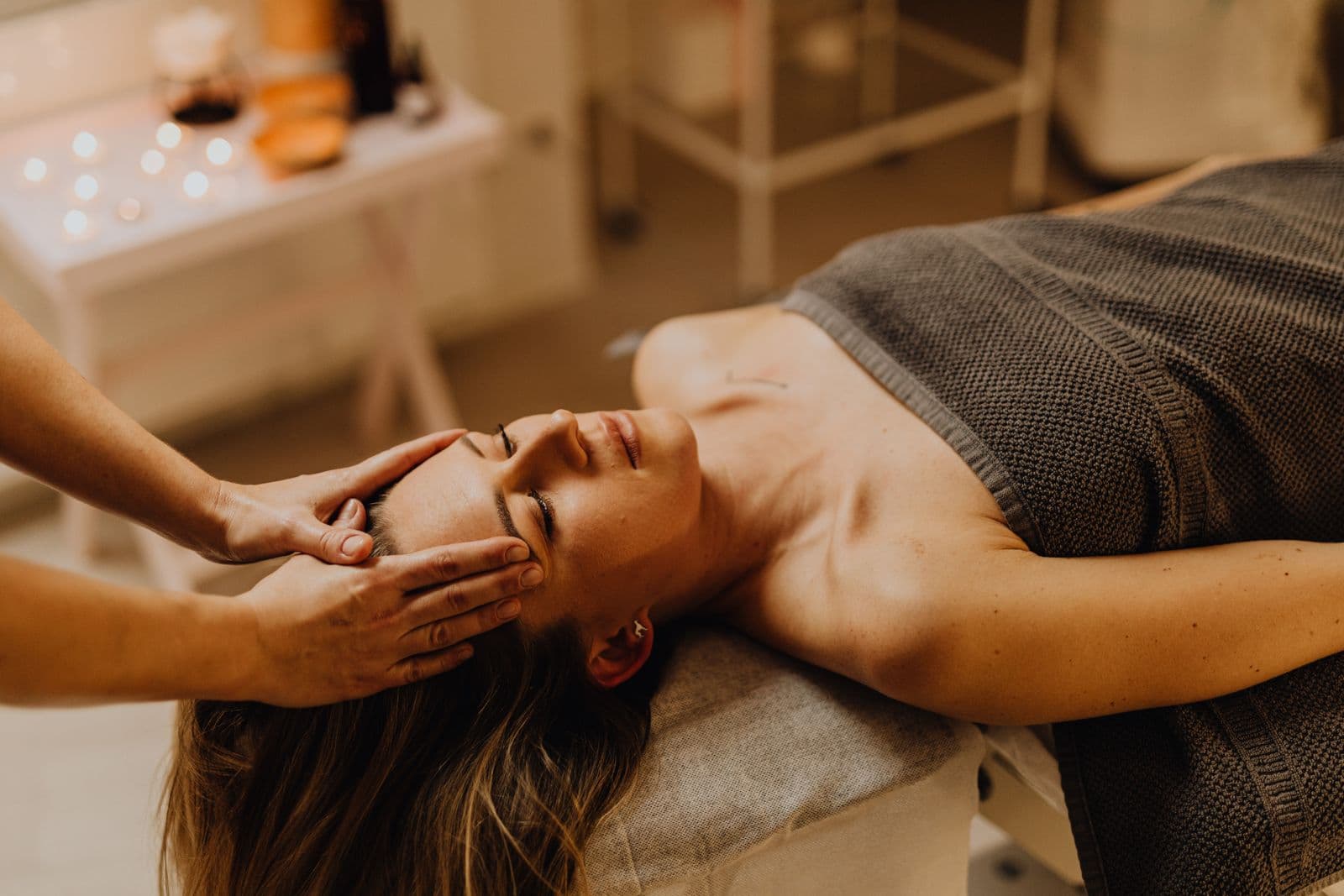 Client receiving a relaxing professional head and scalp massage
