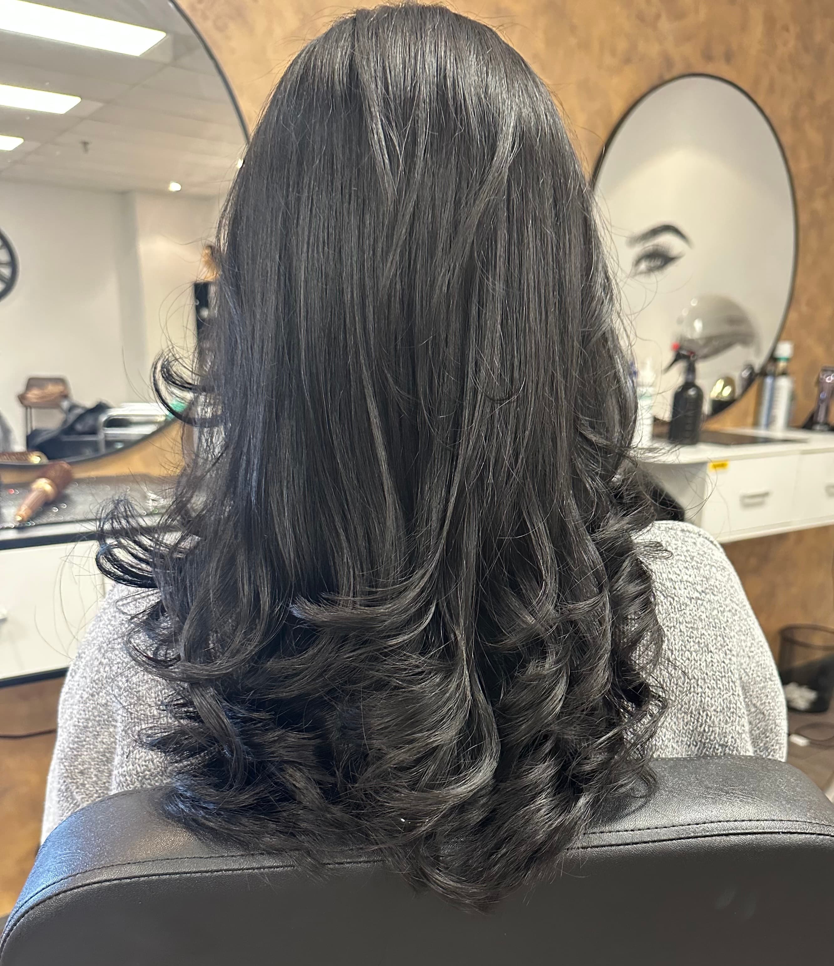 After Sleek Bouncy Blowout